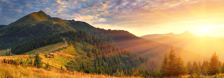 Earth's Physical Systems photo of sunset over mountains