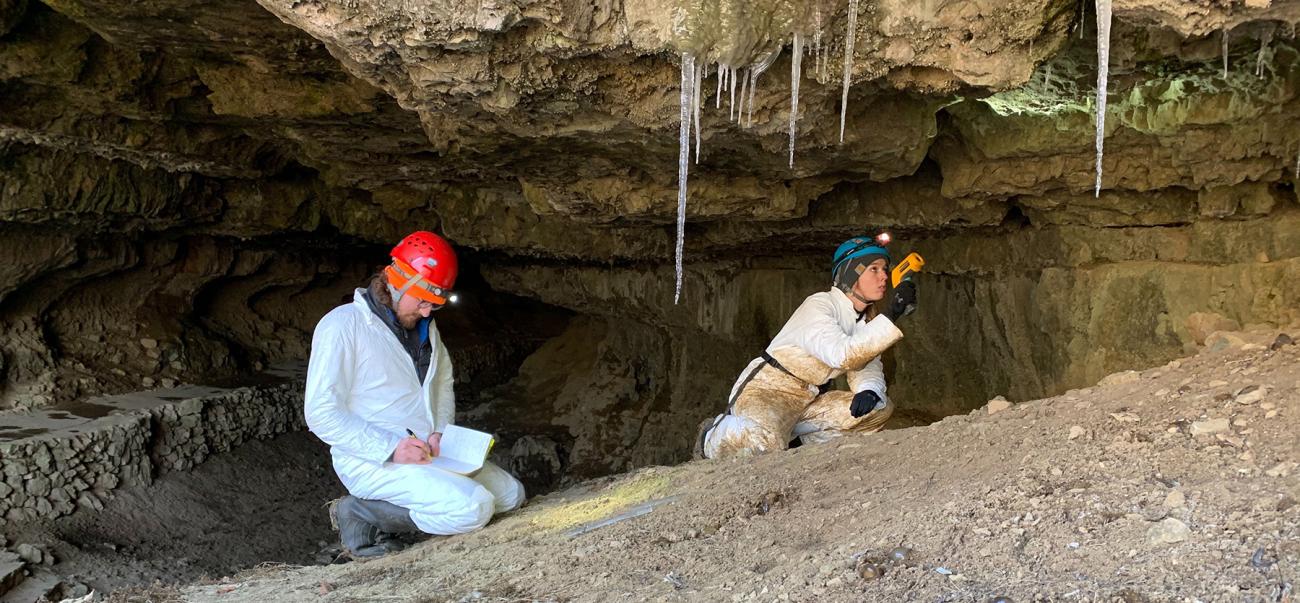 Students explode a cave with a notebook and a flashlight.