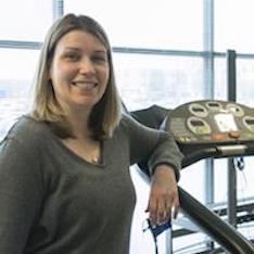 Tara Legar posing with treadmill