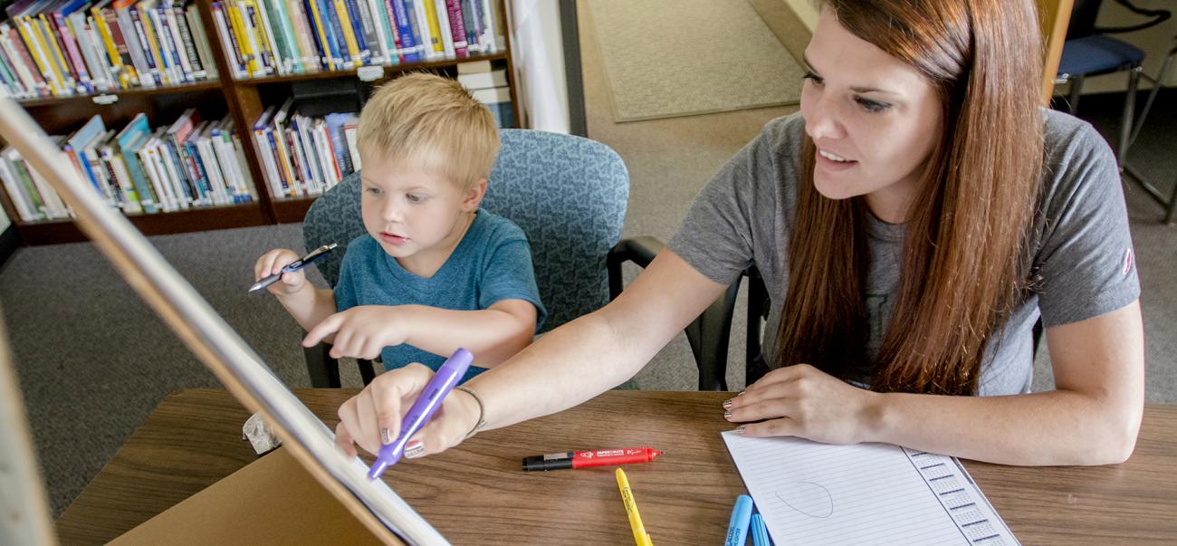 Social Work Student with a Child