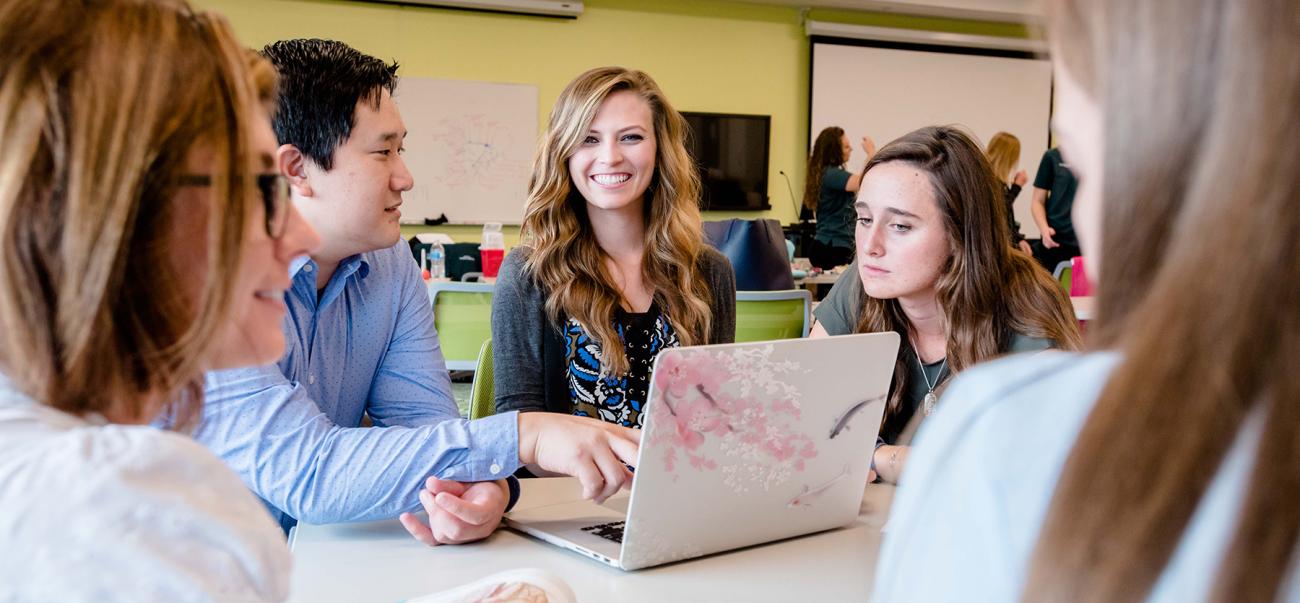 4 students collaborating during a project