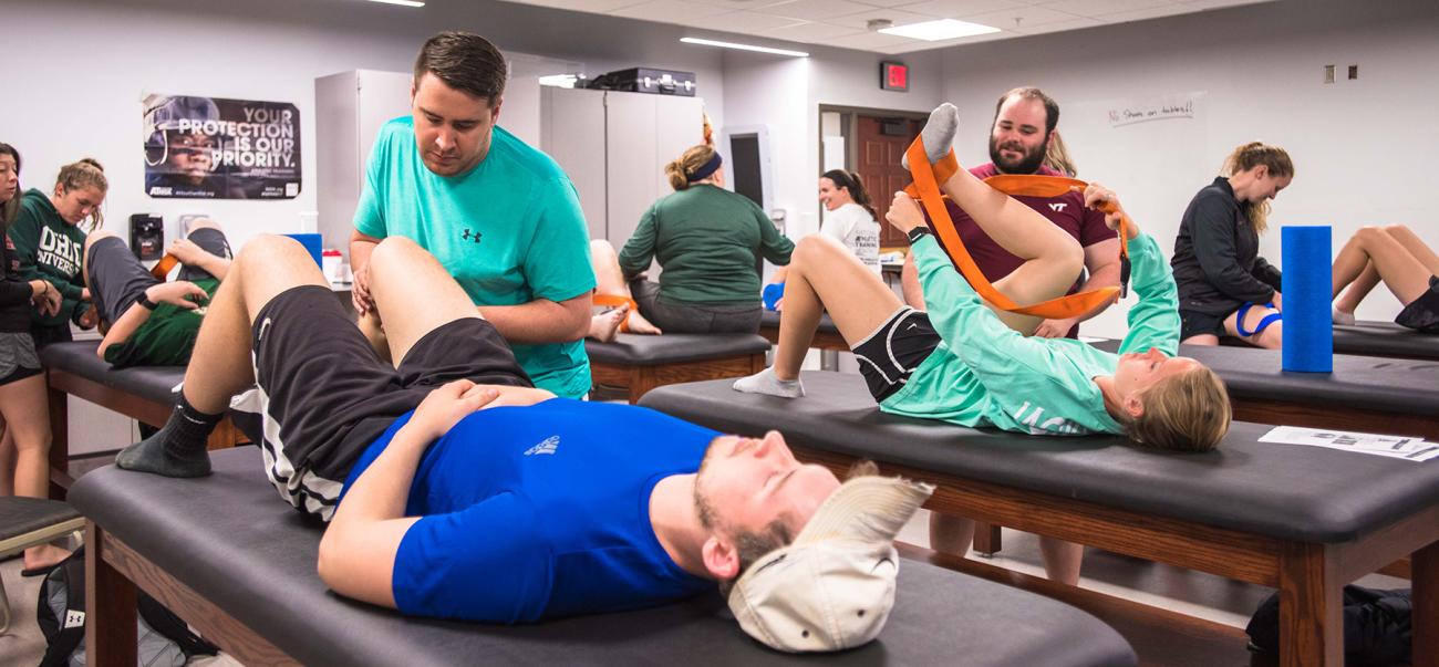 Athletic training students actively working with patients