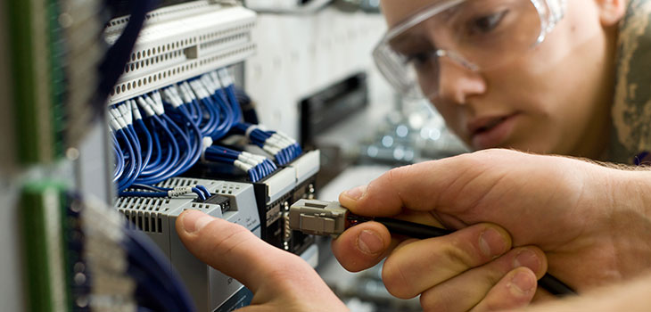 hands plugging together computer parts