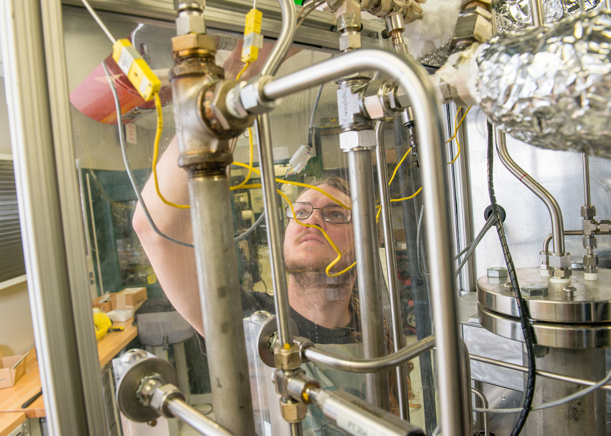 student working on wastewater treatment