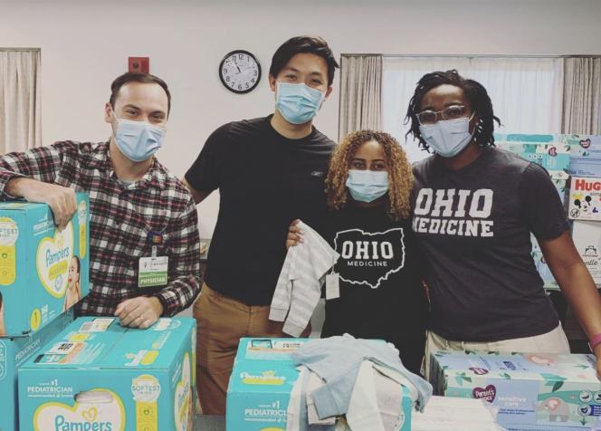 A group of four people within the Baby Bag Project