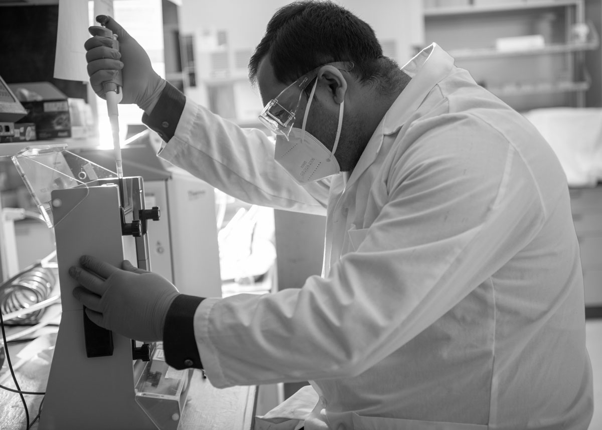 A biochemistry student works on RNA research to inform drug discovery.