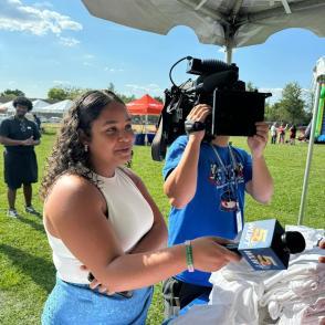 Kylie conducting an interview.