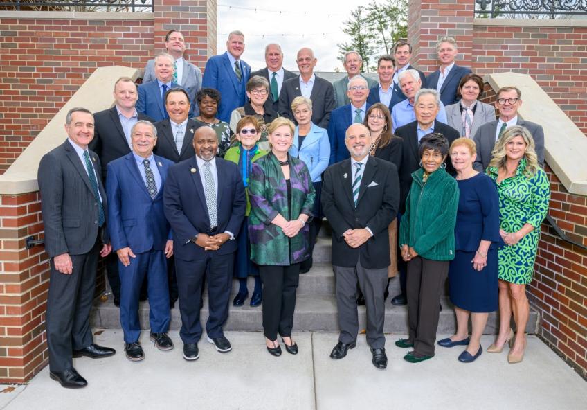 Group photo of The Ohio University Foundation Board members standing on stairs.
