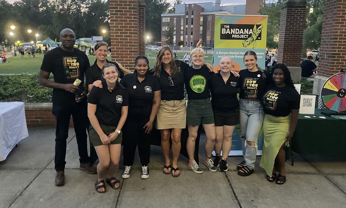 Office of Health Promotion staff pose with students at Ohio University